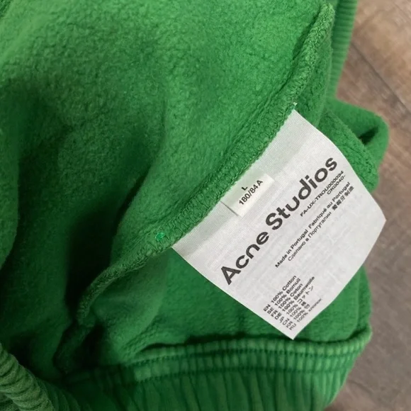 Acne Studios faded green appliqué cotton jersey track pant sweatpants